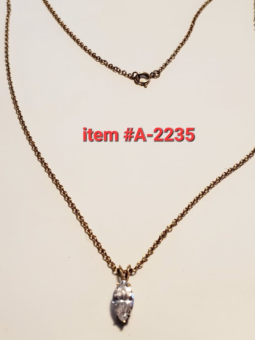 1 Gold Chain Necklace w/ Diamond Stone Pendant, item # A-2235., wt. 6 grams.